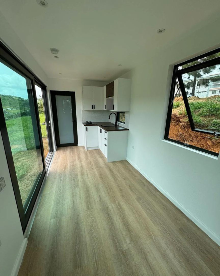 Casa contenedor de 40 pies modelo Playero – módulo prefabricado habitable con diseño abierto y grandes ventanales