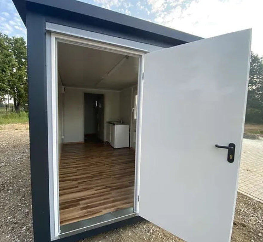 Contenedor oficina 6,00 x 2,40 con WC, ducha y cocina – módulo prefabricado habitable para obra y uso profesional